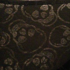 Women's shear skull top